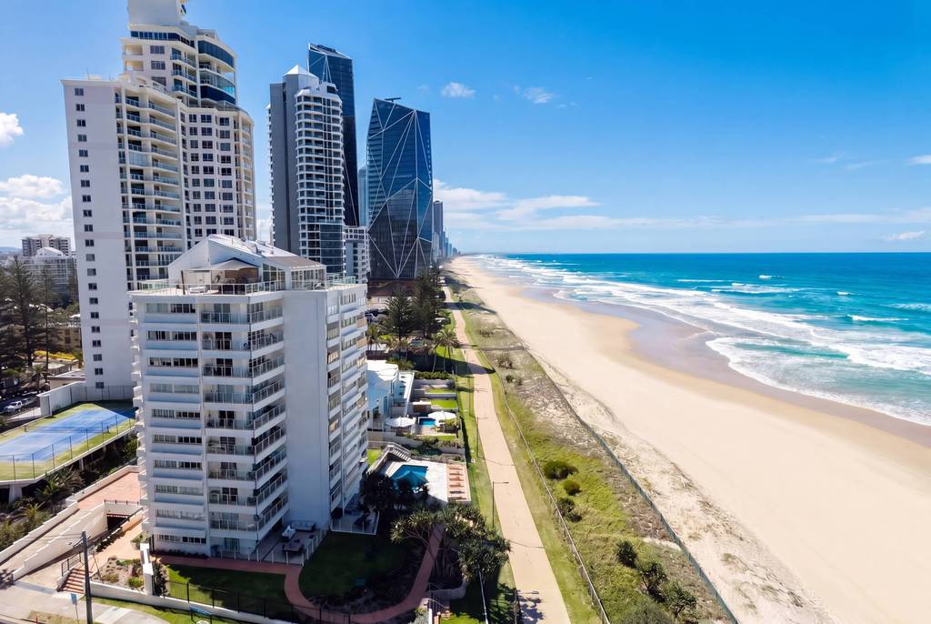 Aerial view down the foreshore past the building