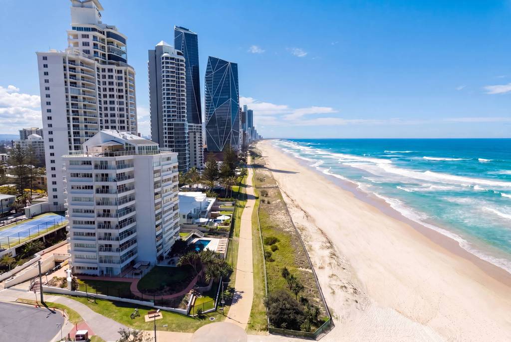 Aerial view of the building with the beach below