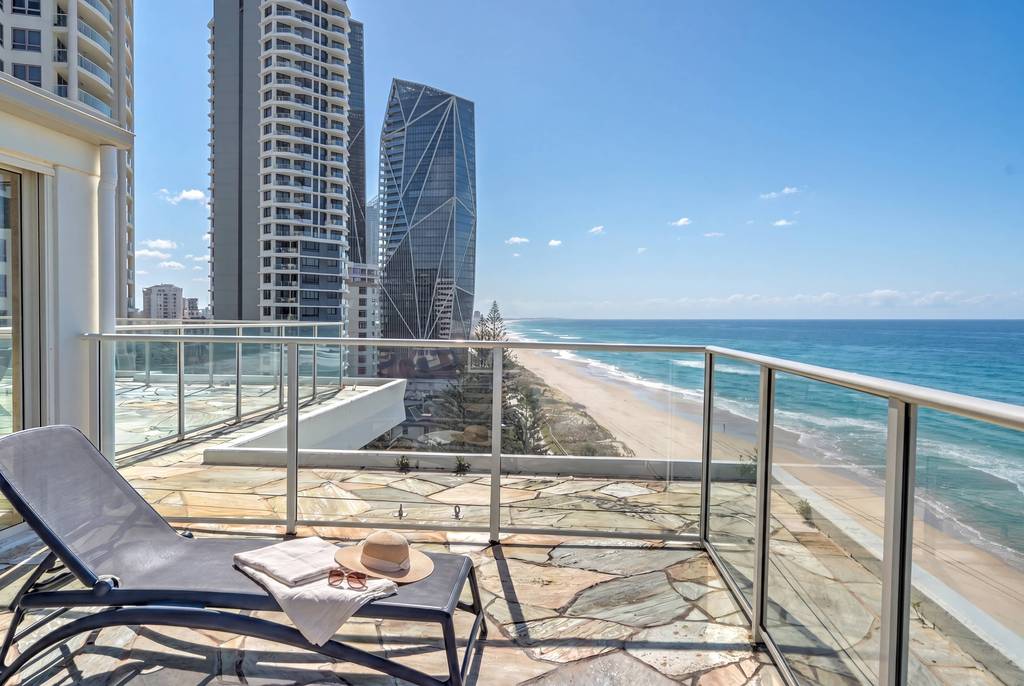 Rooftop lounge chair facing the beach