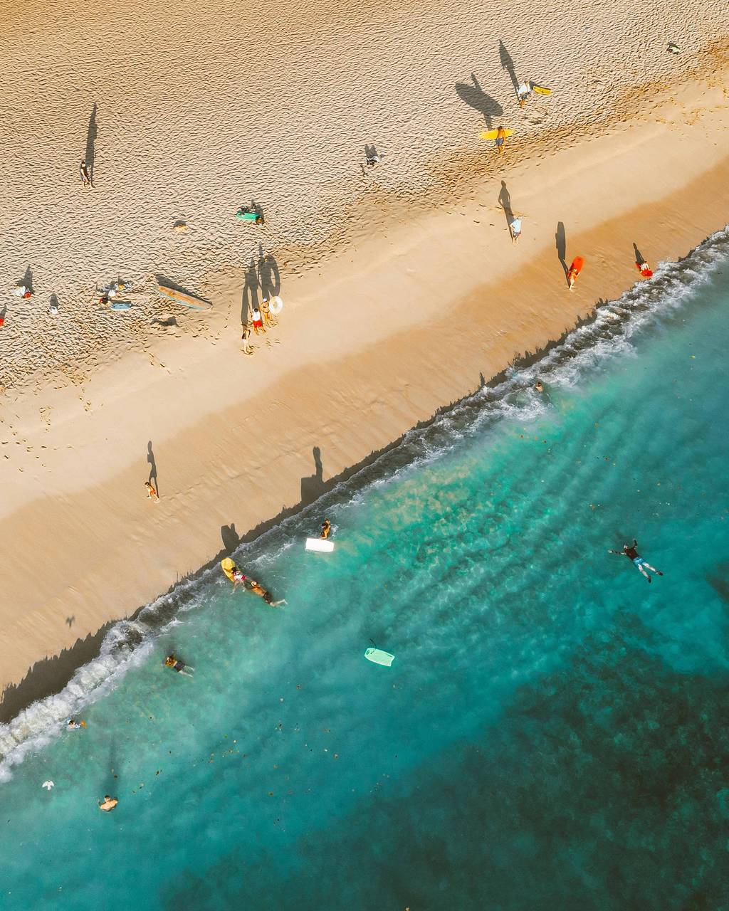 Wooden pier extending into ocean at Surfers Paradise